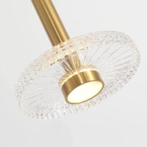 Lámpara colgante Lips en metal dorado con acrílico LED